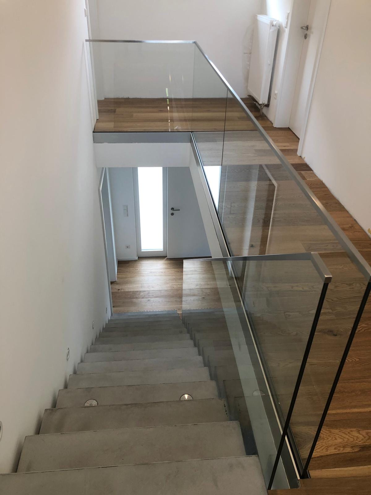 Glasgeländer aus Edelstahl und Glas – Referenz 66 – AN Metallbau GmbH